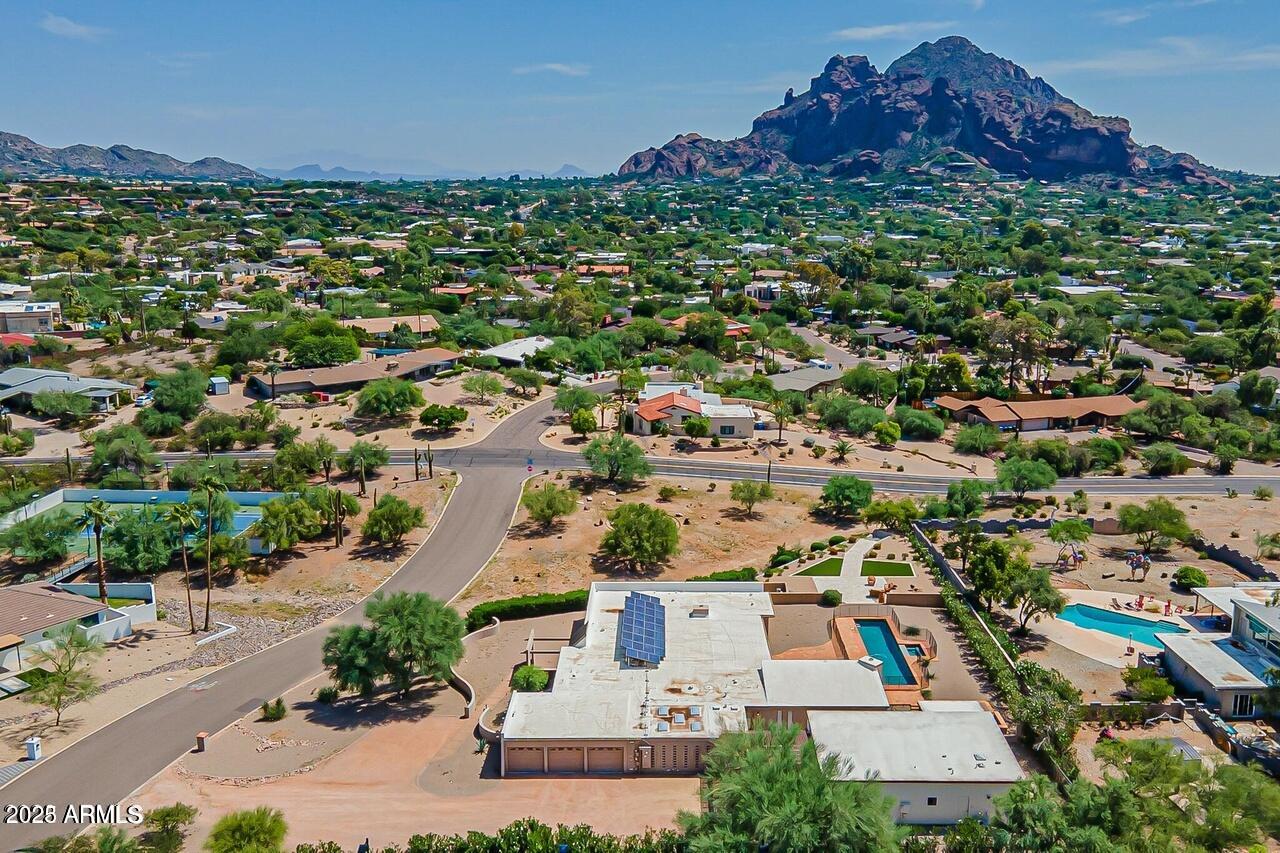 3933 East Rancho Drive Paradise Valley, AZ 85253 - Photo 9 of 27 an aerial view of residential houses with outdoor space and trees