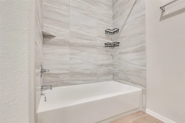 a bathroom with a bathtub