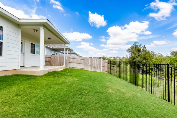 a view of a porch with a backyard