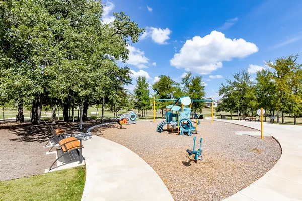 a view of a swimming pool with a slide