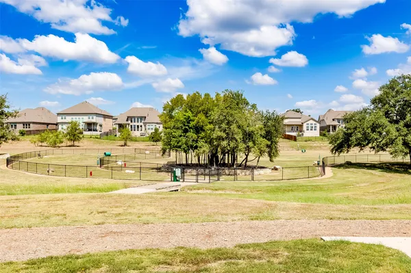 a view of a swimming pool with an ocean view