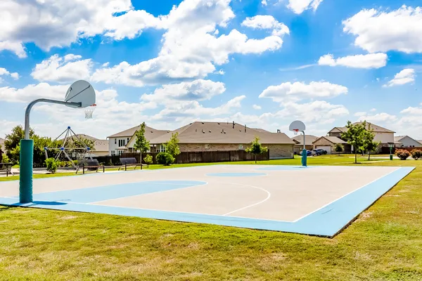 a view of an swimming pool and an outdoor space
