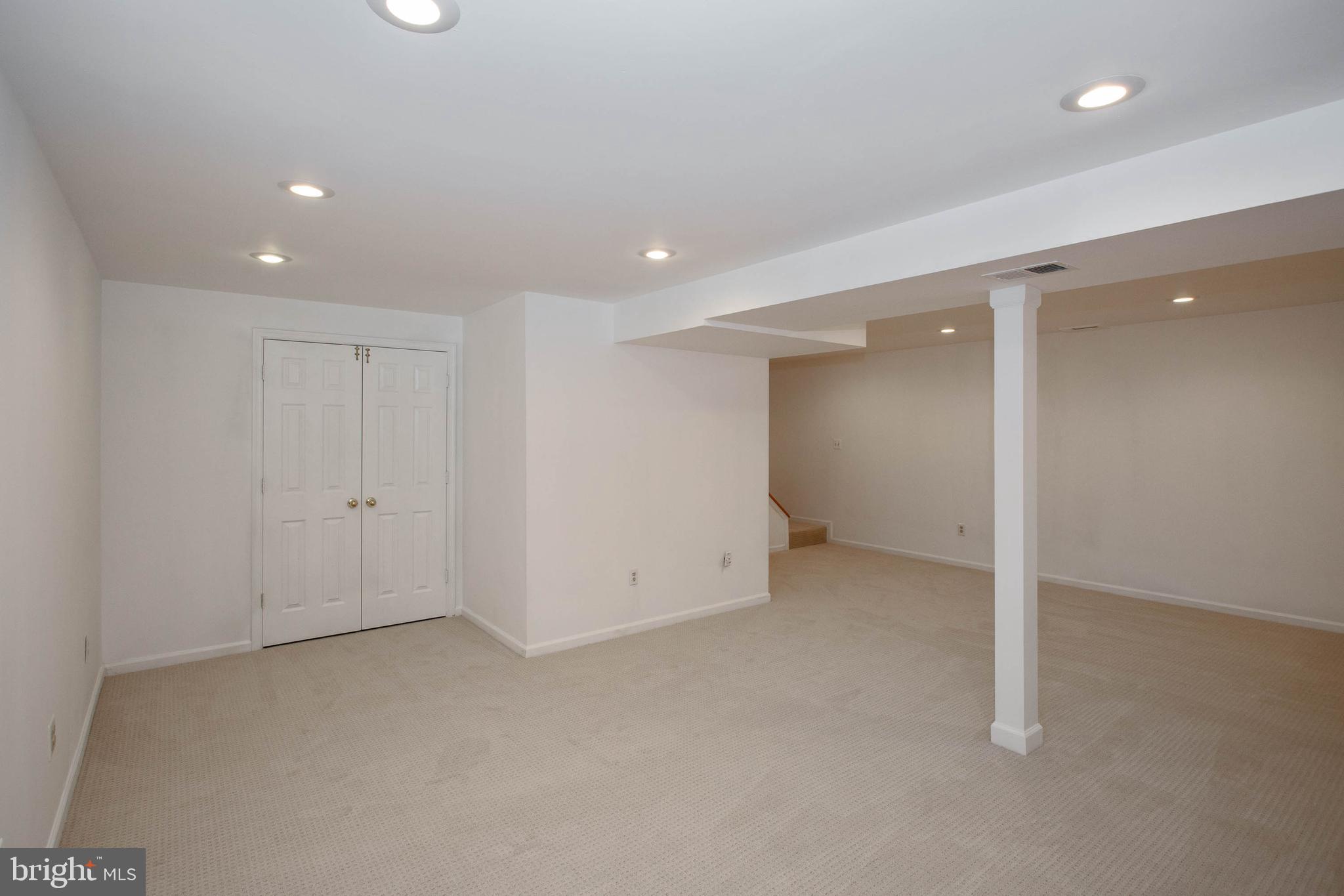 11701 Old Bayberry Lane Reston, VA 20194 - Photo 31 of 36 Double doors lead to large storage w bath rough in