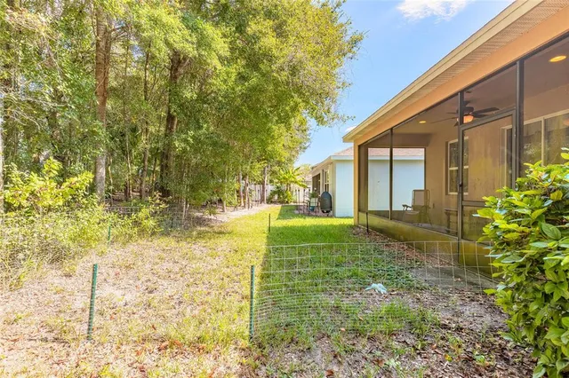 a view of back yard of the house