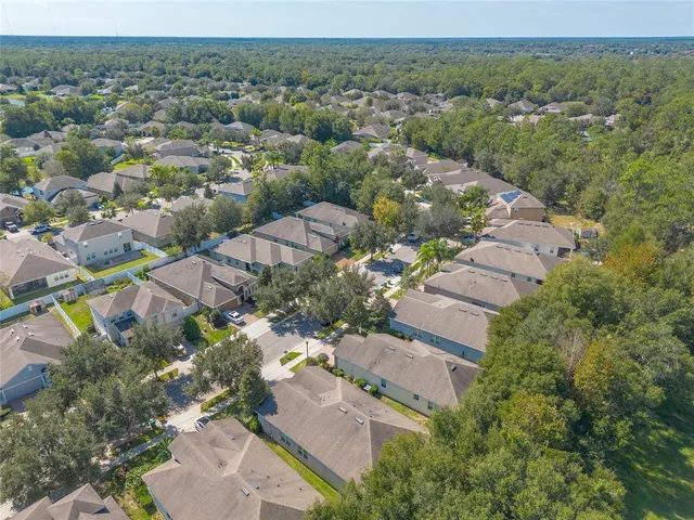 an aerial view of a city with lots of residential buildings