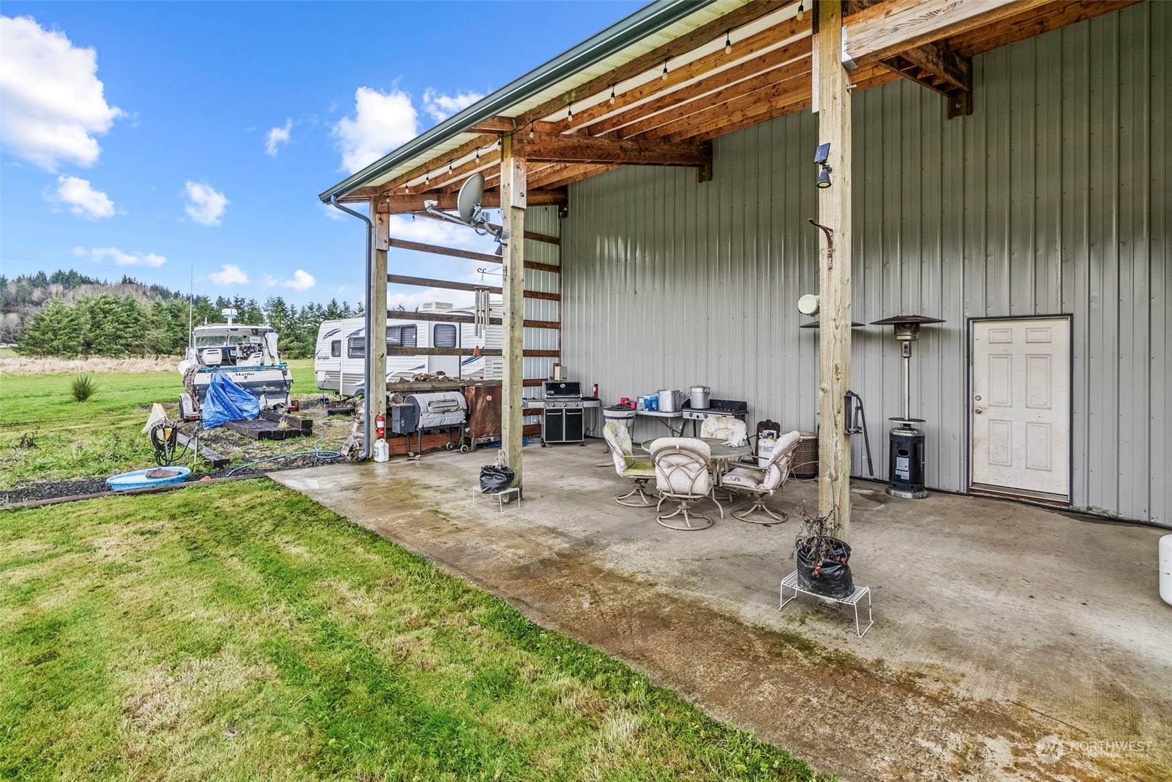 280 East Valley Road Skamokawa, WA 98647 - Photo 13 of 30 a view of a house with sitting area and furniture