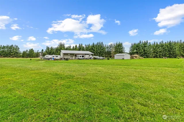 a view of a garden with an outdoor space