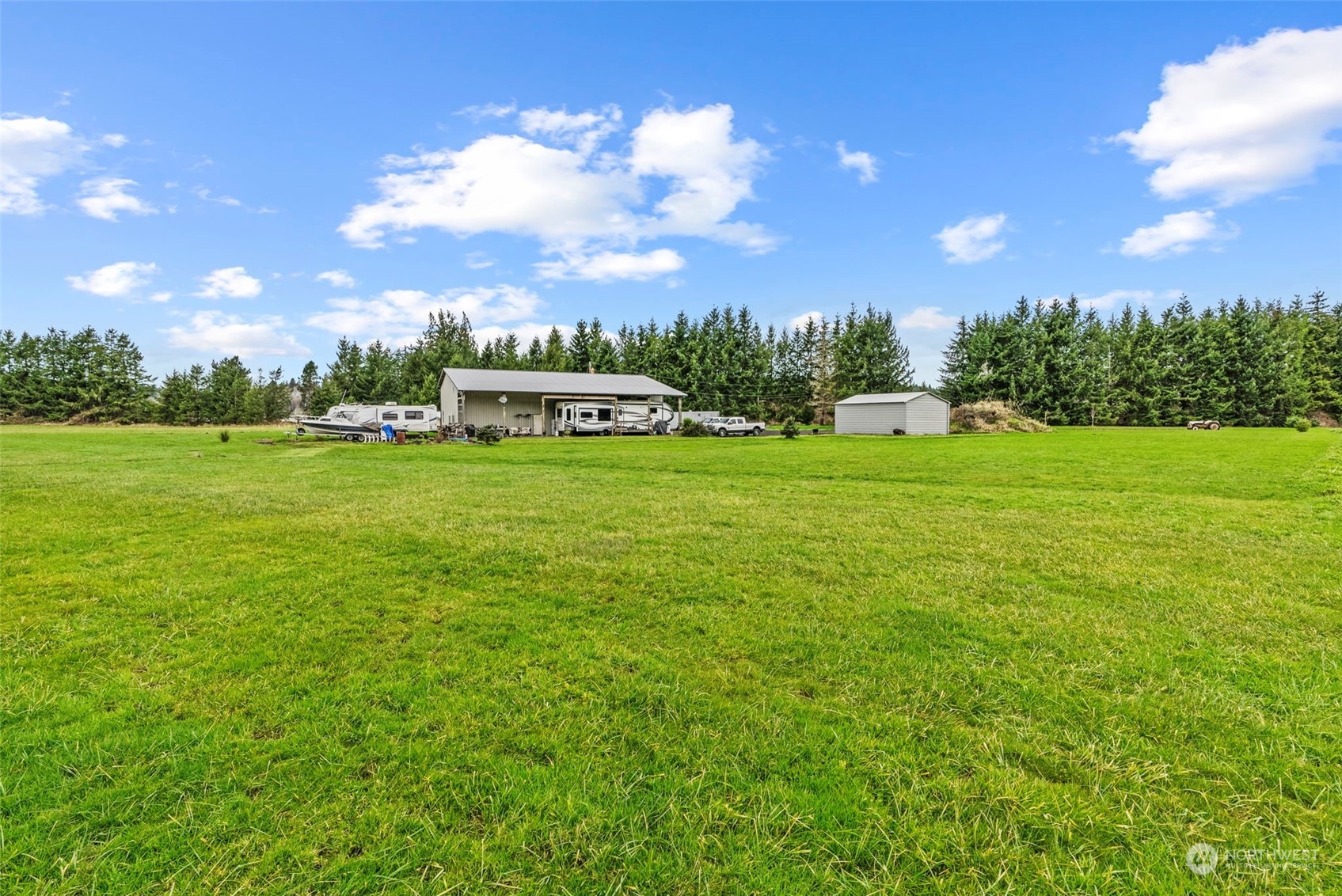 280 East Valley Road Skamokawa, WA 98647 - Photo 27 of 30 a view of a big yard with a house in the background