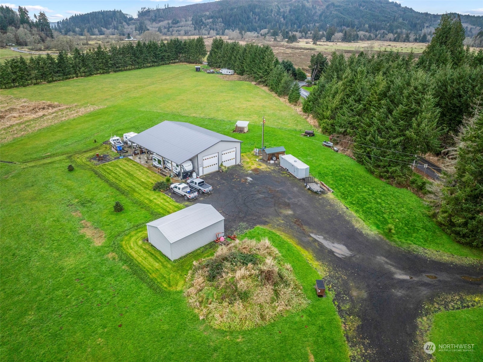 280 East Valley Road Skamokawa, WA 98647 - Photo 3 of 30 an aerial view of a house with pool garden and a yard