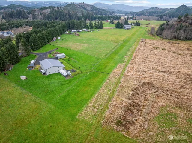 a view of a backyard with an outdoor space