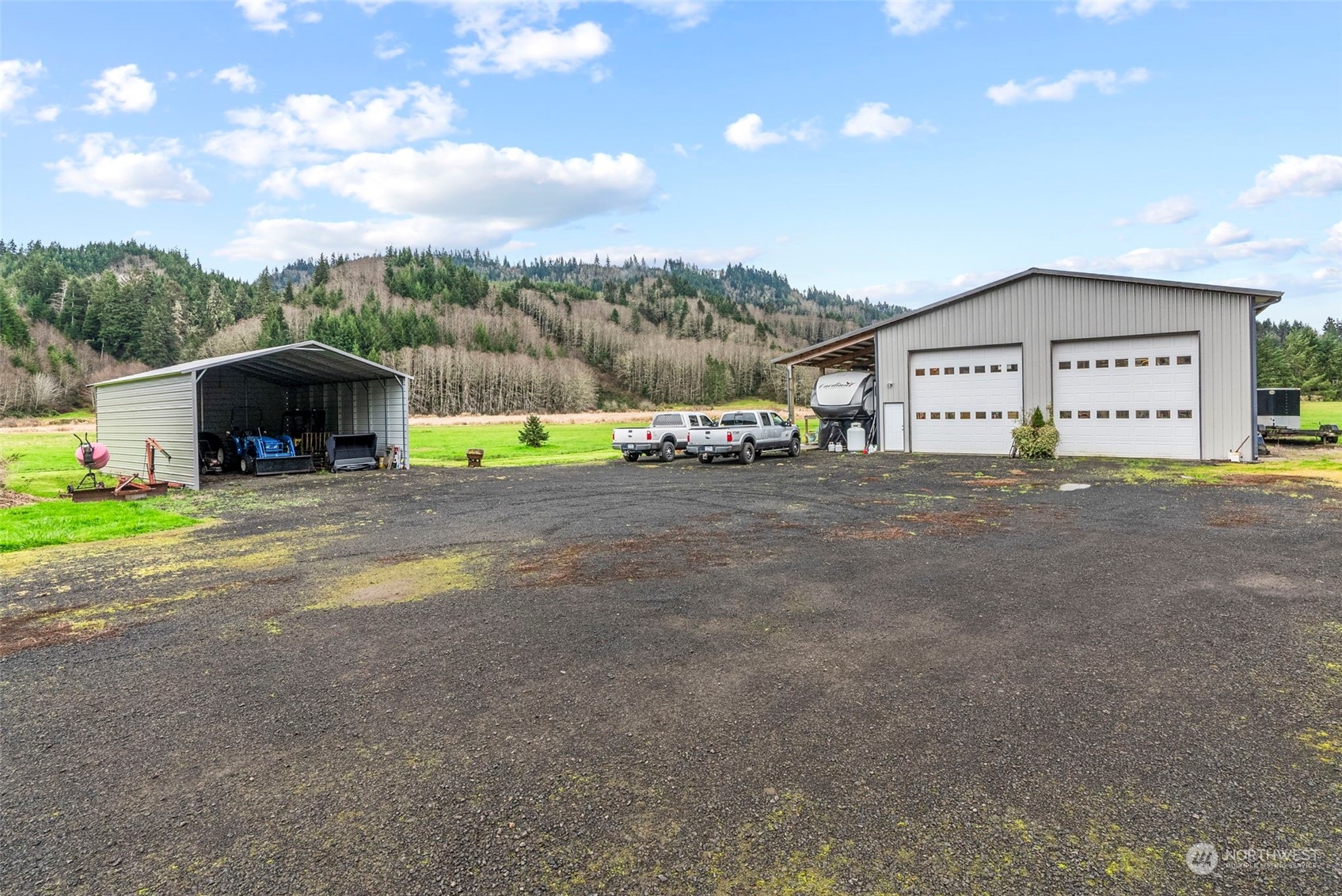 280 East Valley Road Skamokawa, WA 98647 - Photo 6 of 30 a view of a house with a yard and sitting area