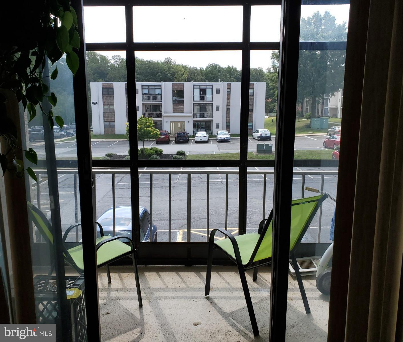76 Welsh Tract Road, Unit 201 Newark, DE 19713 - Photo 20 of 26 Glass Porch to Outside