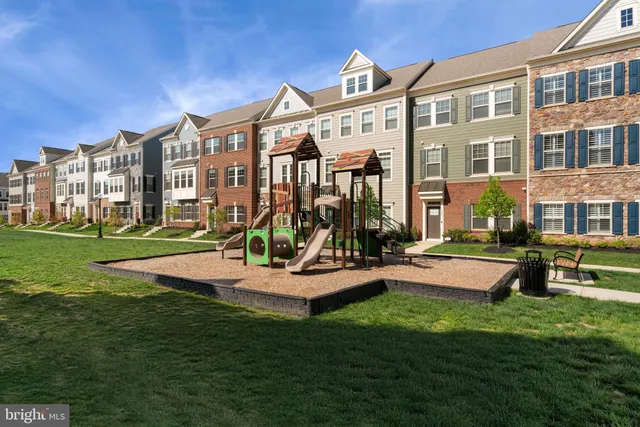 a view of a building with a yard