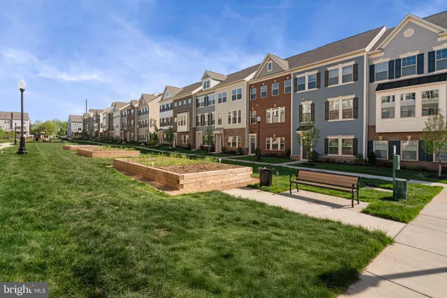 a view of a building with a yard