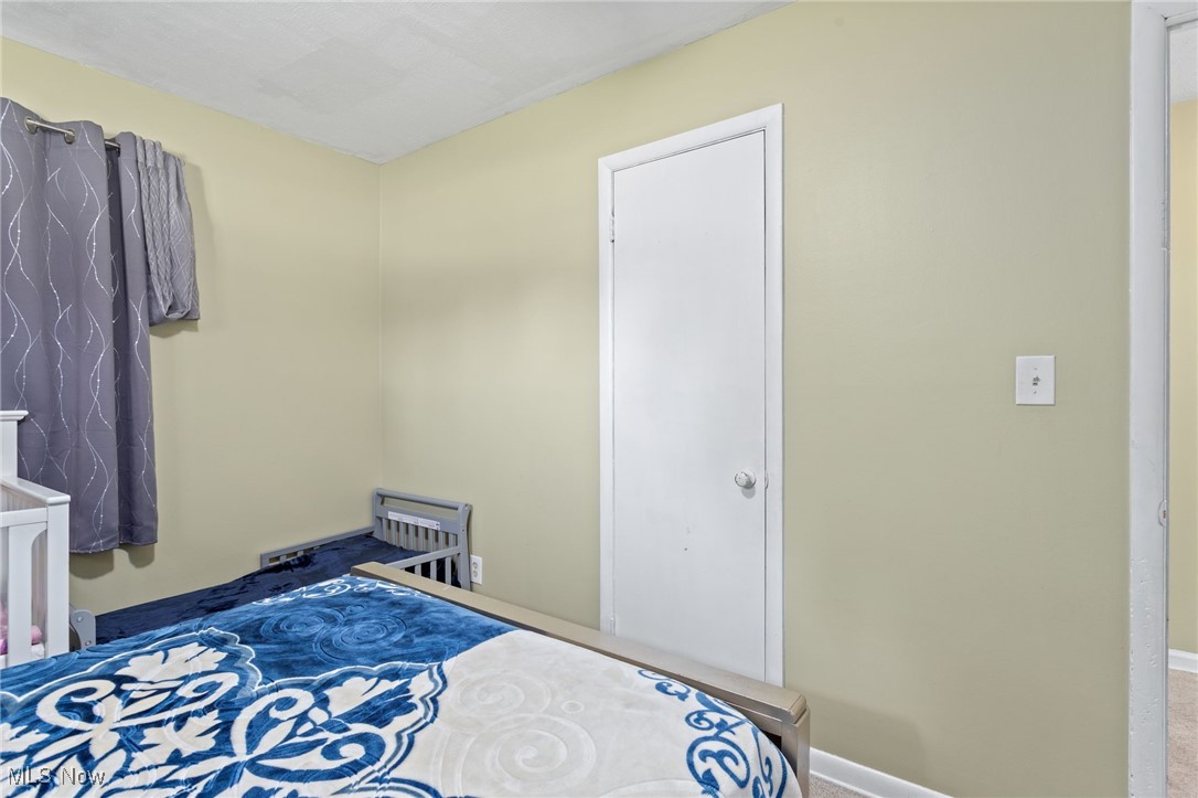 12972 West Sprague Road Cleveland, OH 44130 - Photo 9 of 23 Bedroom featuring carpet floors