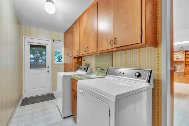 an aerial view of a house with outdoor space