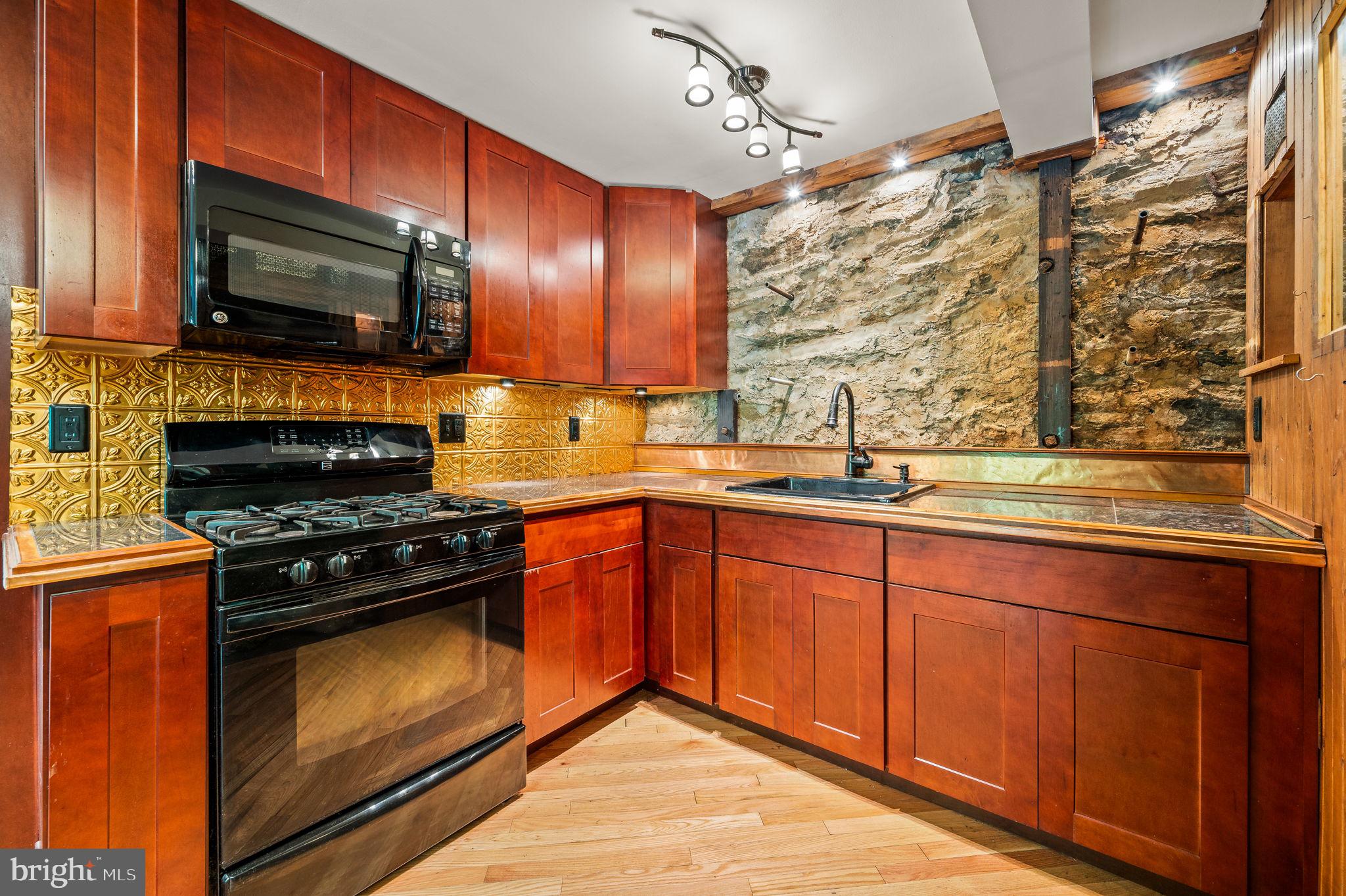 101 West Rose Valley Road Rose Valley, PA 19086 - Photo 53 of 65 103 W Rose Valley Lower Level Kitchen