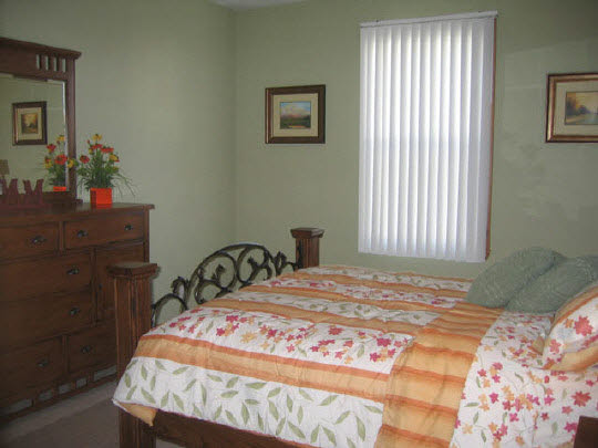10344 Marblewing Road Roscoe, IL 61073 - Photo 3 of 10 a bedroom with a bed and a window
