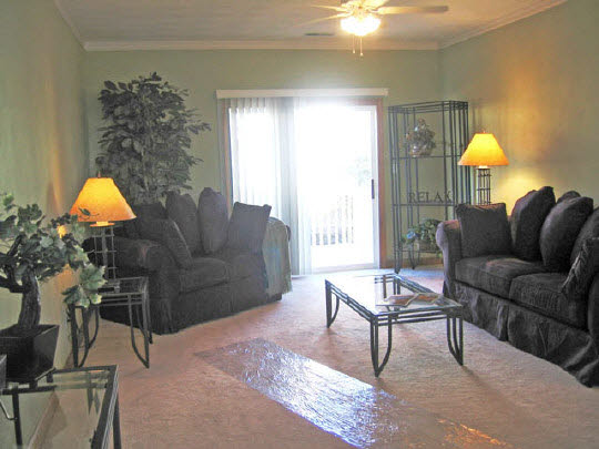 10344 Marblewing Road Roscoe, IL 61073 - Photo 5 of 10 a living room with furniture and a chandelier