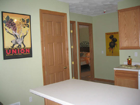 10344 Marblewing Road Roscoe, IL 61073 - Photo 8 of 10 a bedroom with a bed and a table in it