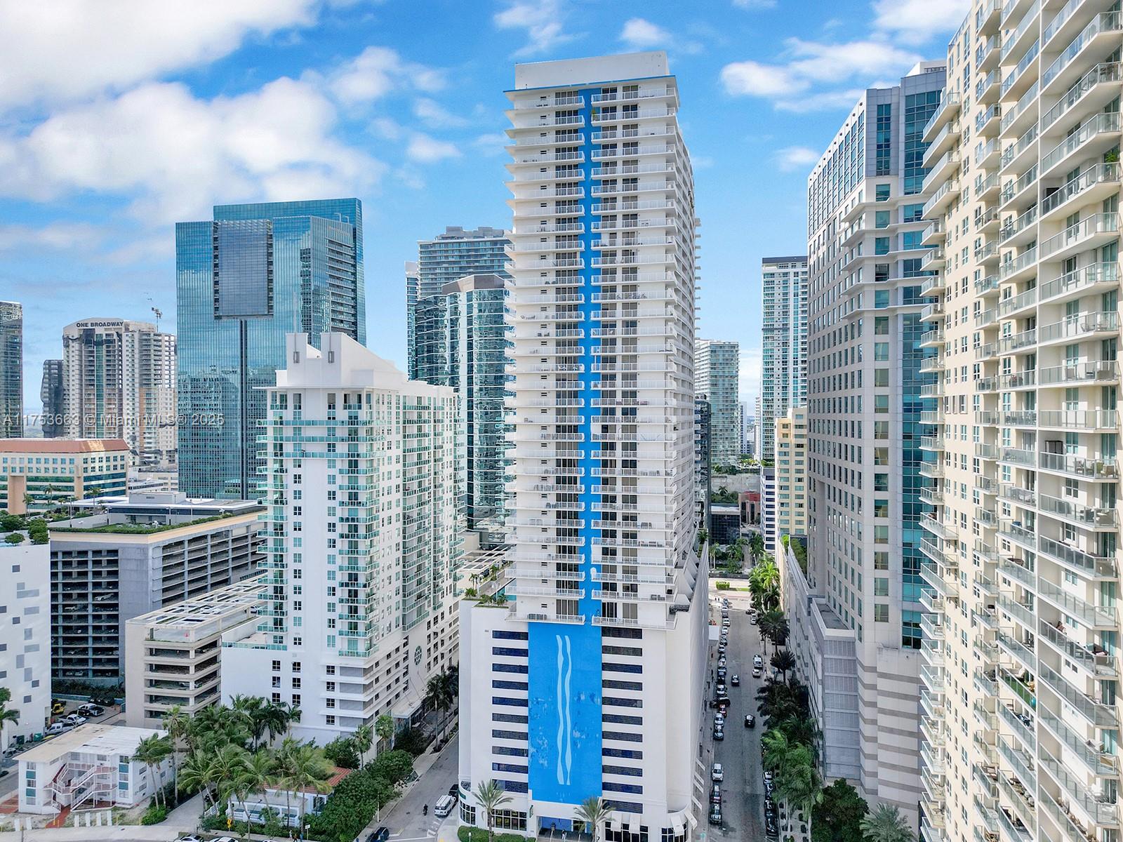 1200 Brickell Bay Drive, Unit 4019 Miami, FL 33131 - Photo 1 of 32 a city view with tall buildings