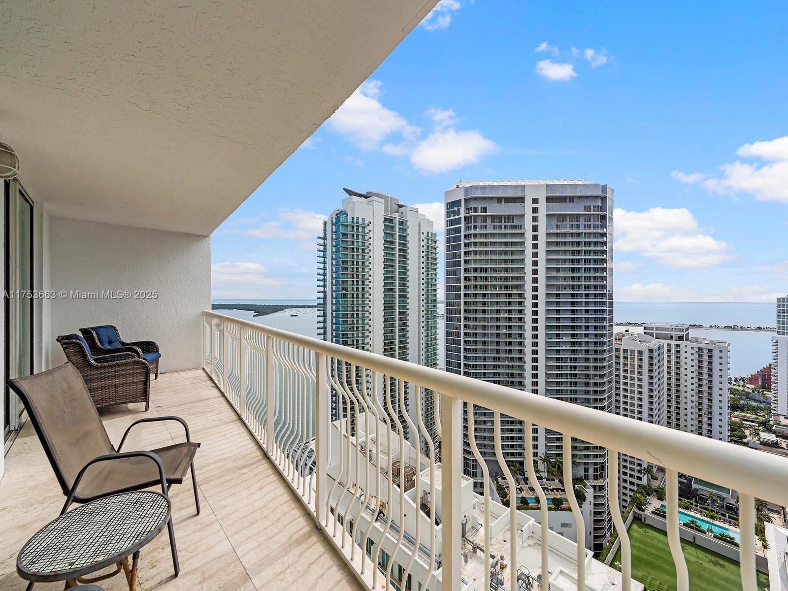 1200 Brickell Bay Drive, Unit 4019 Miami, FL 33131 - Photo 15 of 32 a view of balcony with furniture