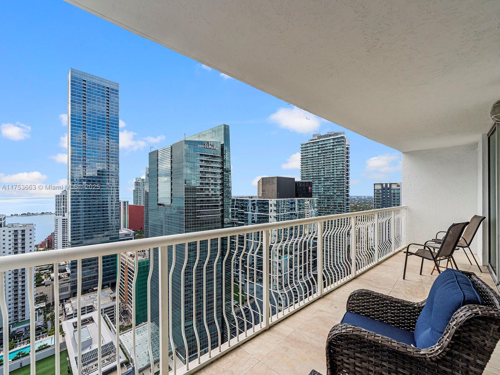 1200 Brickell Bay Drive, Unit 4019 Miami, FL 33131 - Photo 17 of 32 a view of balcony with furniture