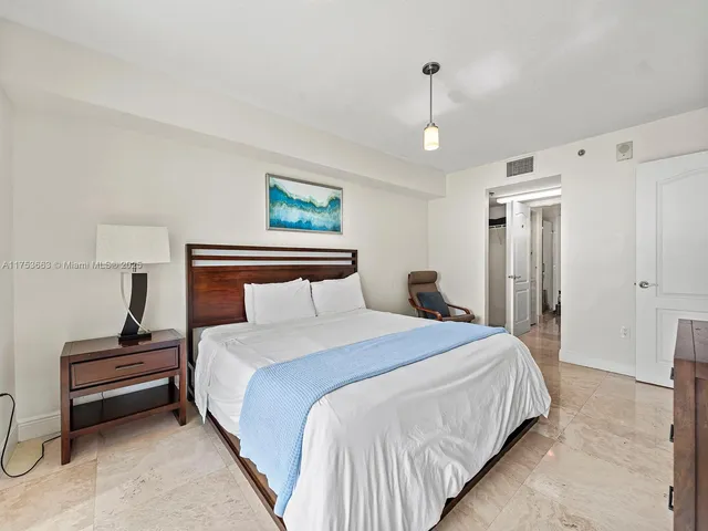 wooden floor with a bathroom
