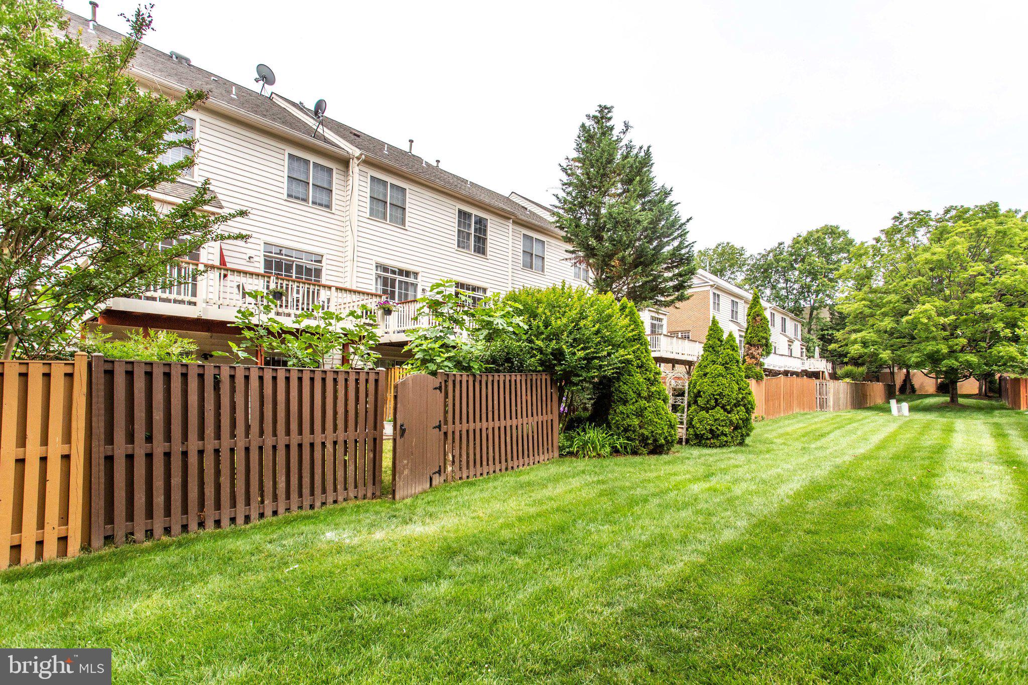 136 Roland Court Southwest Vienna, VA 22180 - Photo 65 of 67 Lovely fenced backyard and green common area!