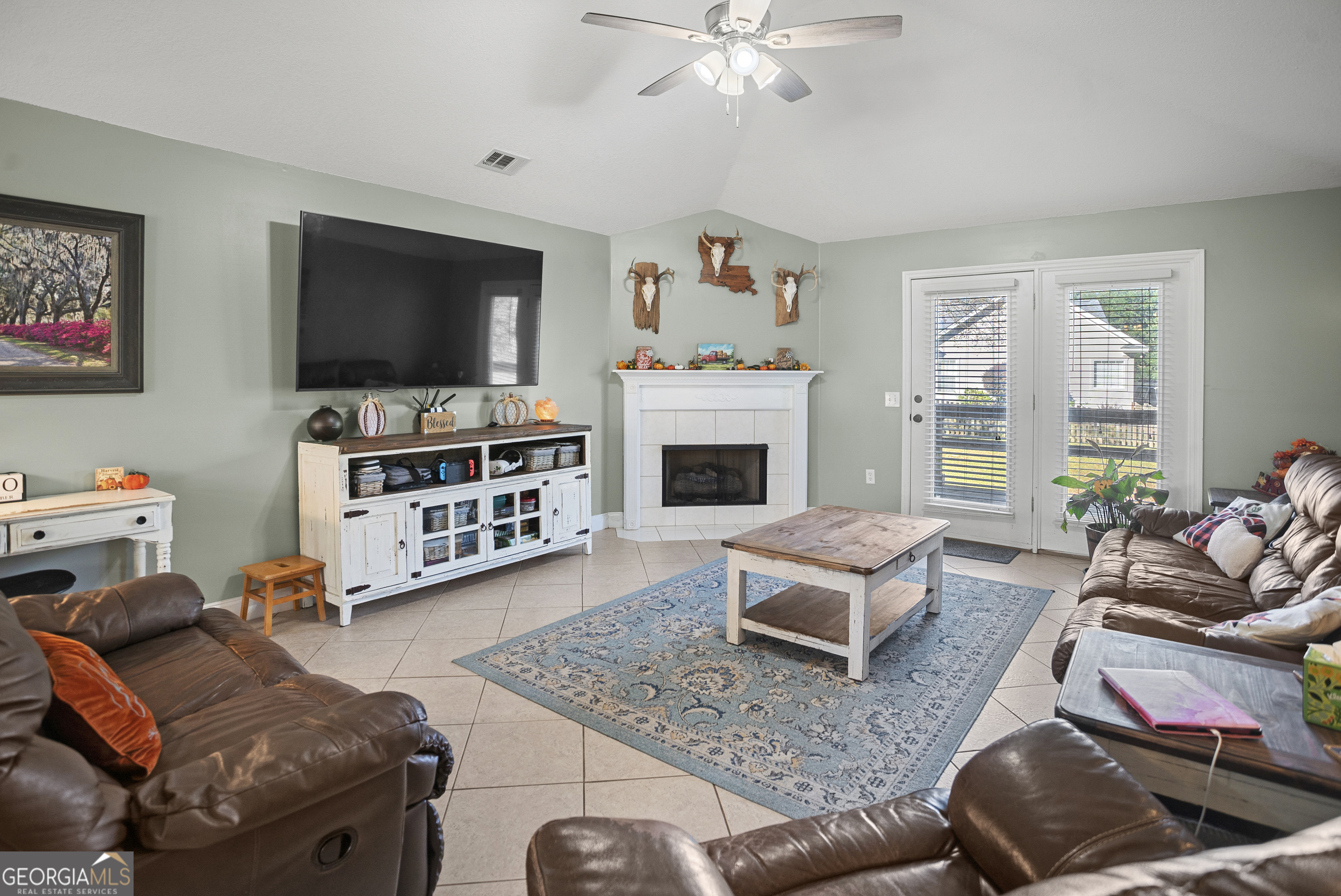 29 Sterling Court Ellabell, GA 31308 - Photo 11 of 40 a living room with furniture and a flat screen tv