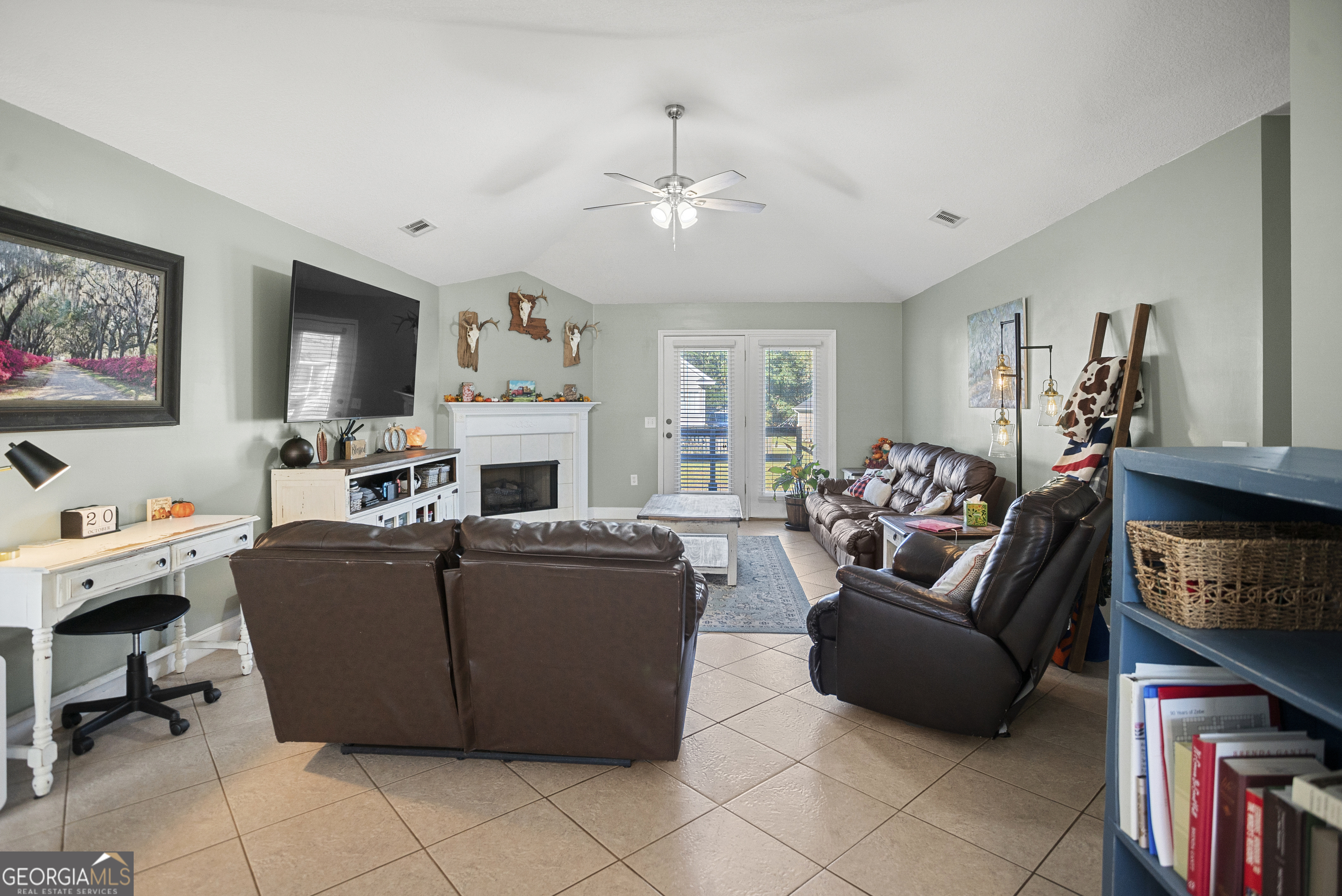 29 Sterling Court Ellabell, GA 31308 - Photo 12 of 40 a living room with furniture and a flat screen tv