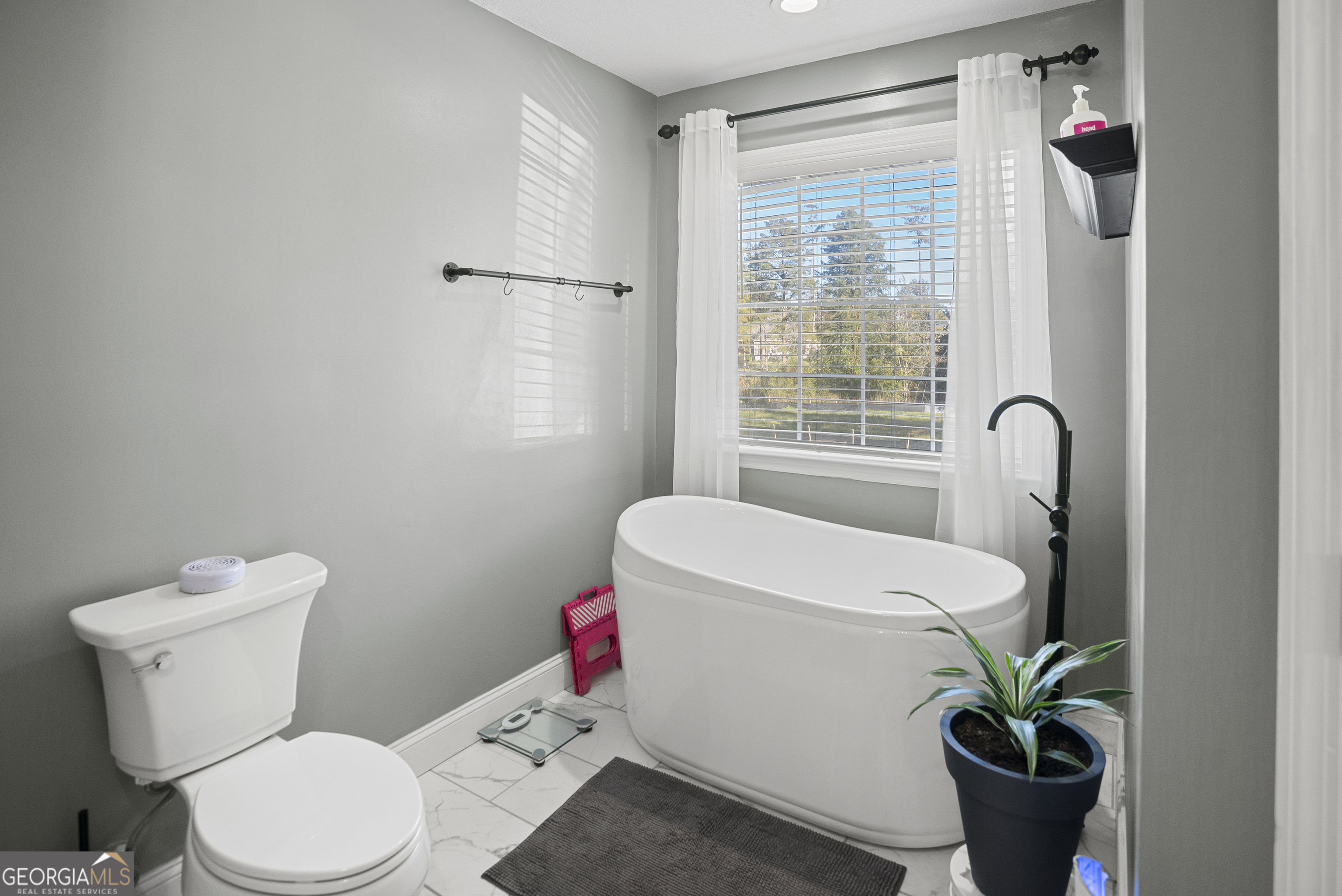 29 Sterling Court Ellabell, GA 31308 - Photo 18 of 40 a bathroom with a toilet and a shower