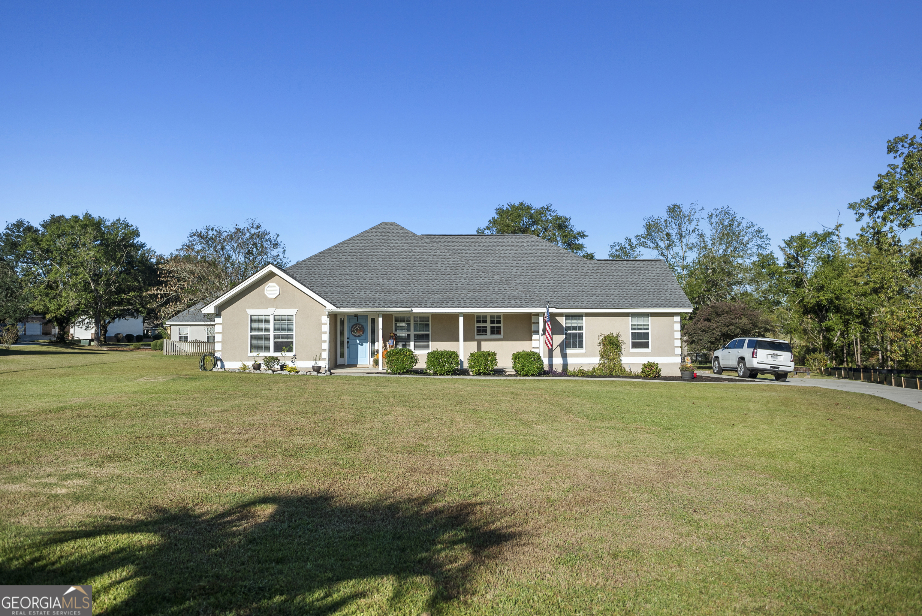 29 Sterling Court Ellabell, GA 31308 - Photo 2 of 40 front view of a house with a yard