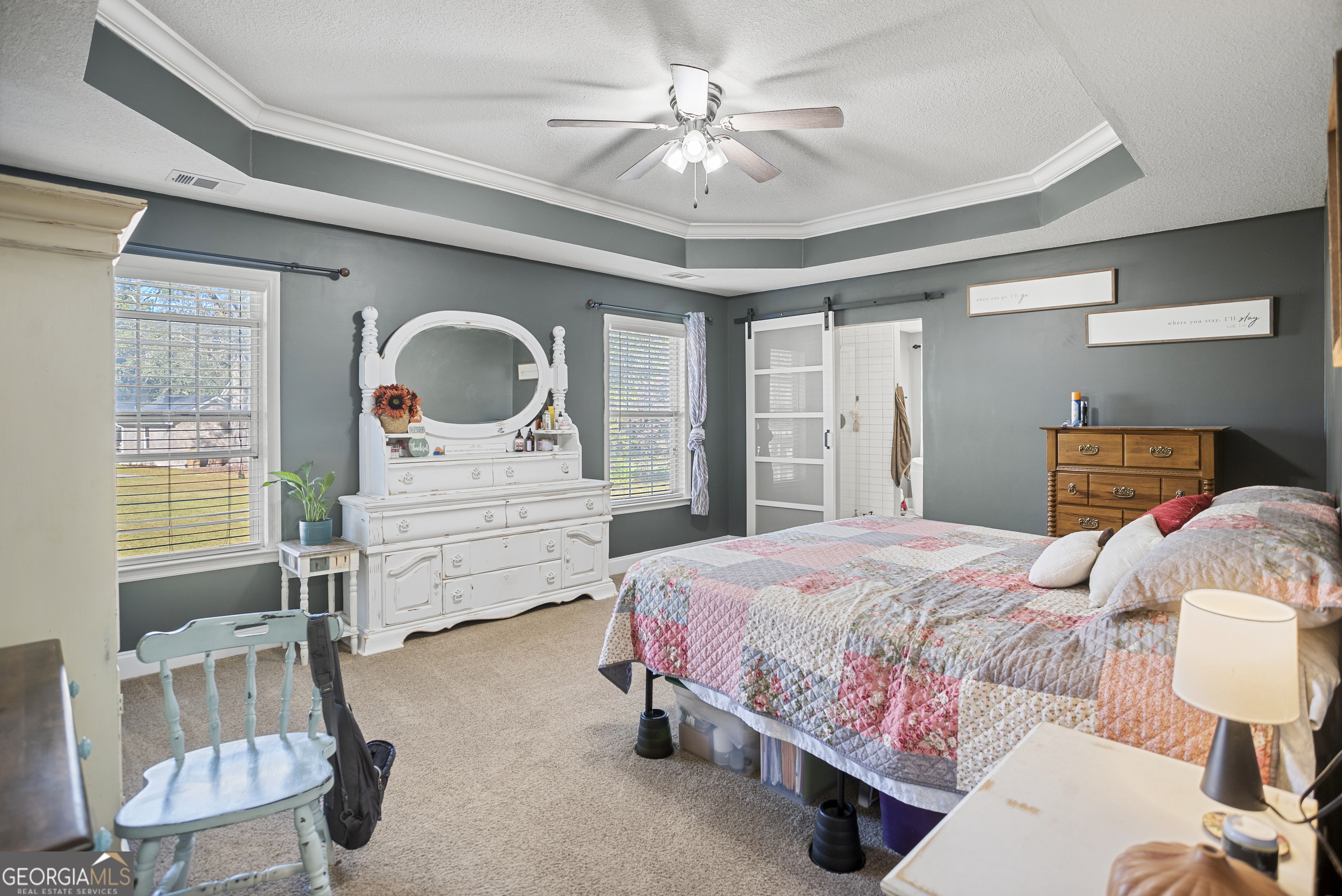 29 Sterling Court Ellabell, GA 31308 - Photo 21 of 40 a bedroom with a bed a window and dresser