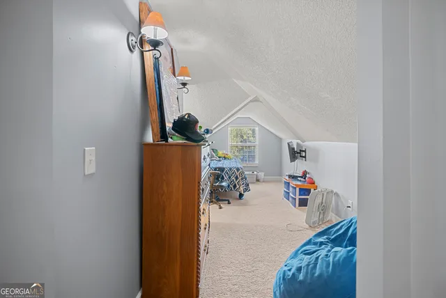 a view of storage and utility room with toys