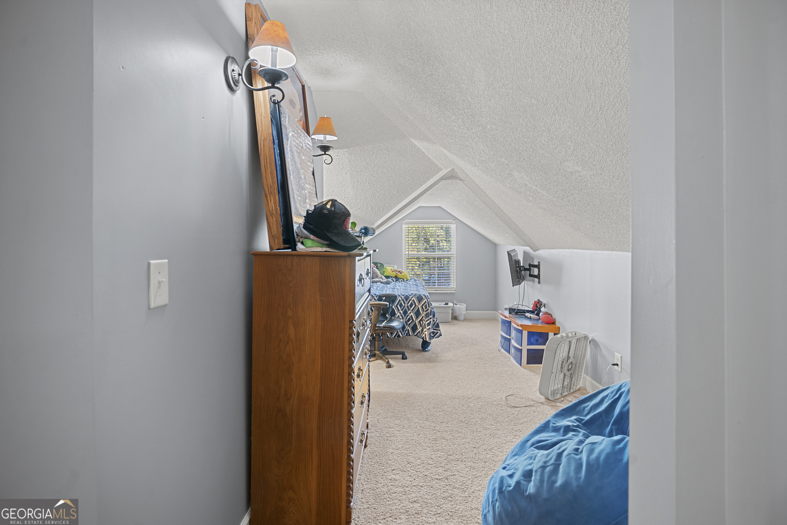 29 Sterling Court Ellabell, GA 31308 - Photo 34 of 40 a view of storage and utility room with toys