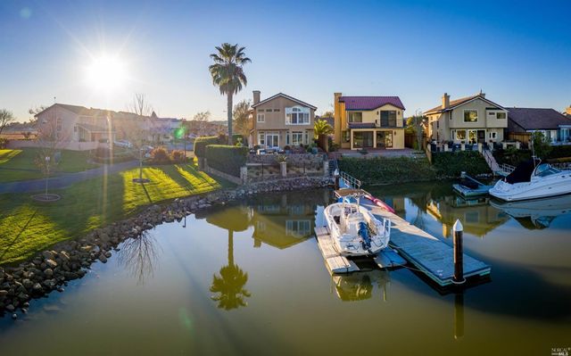 a swimming pool view with a lake view