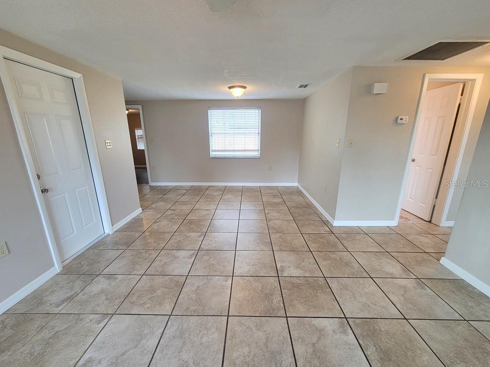 7335 Castanea Drive Port Richey, FL 34668 - Photo 6 of 20 a view of an empty room and a window