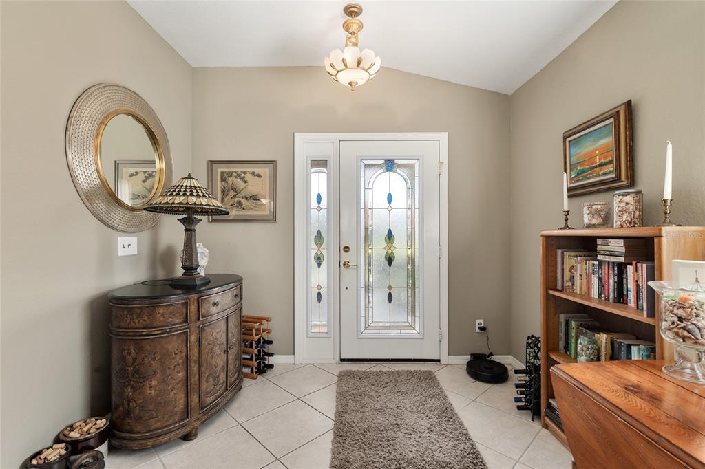 9063 Southeast 120th Loop Summerfield, FL 34491 - Photo 11 of 90 a view of a workspace with furniture and a window