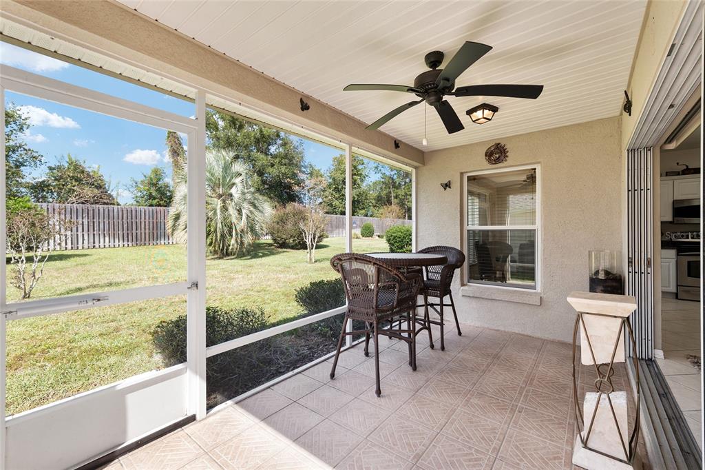 9063 Southeast 120th Loop Summerfield, FL 34491 - Photo 45 of 90 a view of a dining room with furniture window and outside view