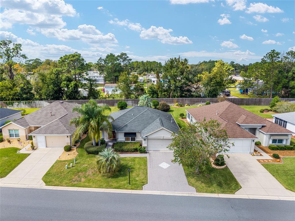 9063 Southeast 120th Loop Summerfield, FL 34491 - Photo 57 of 90 an aerial view of a house with a garden