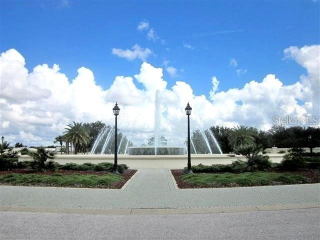 9063 Southeast 120th Loop Summerfield, FL 34491 - Photo 69 of 90 a view of a park with swings and slides