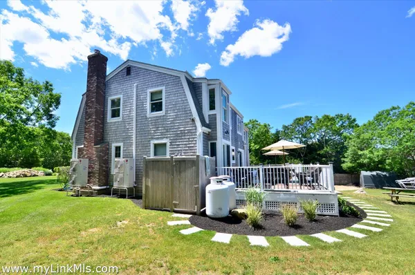 a view of a house with a big yard