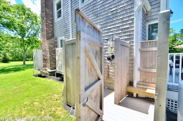 a backyard of a house with lots of green space