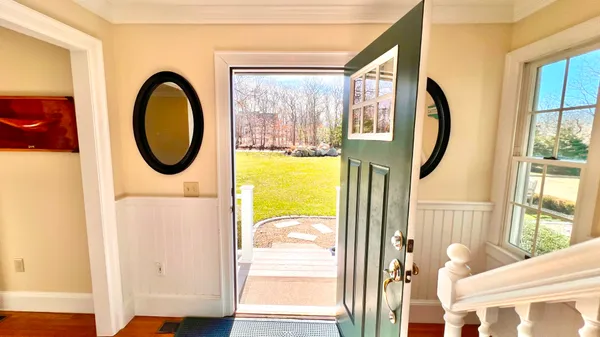 a view of a porch with a sitting area