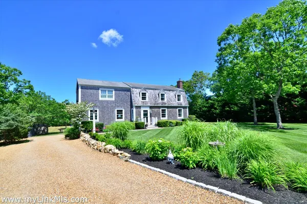 a view of a backyard of a house