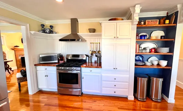 a bedroom with a bed and a lamp