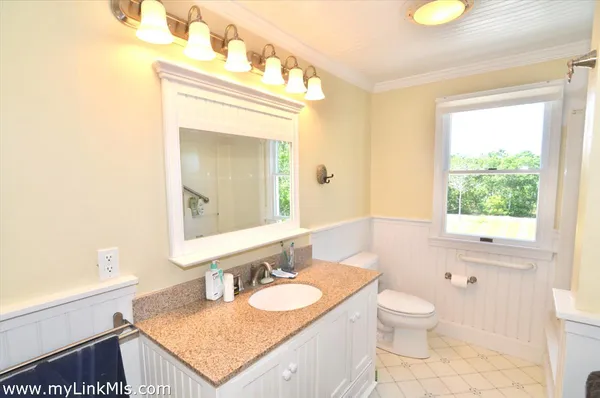 a view of a hallway with staircase