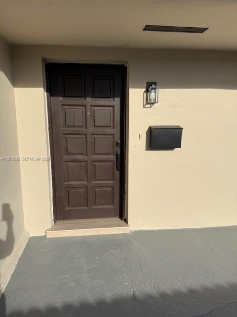 11063 Southwest 5th Street, Unit 11063 Sweetwater, FL 33174 - Photo 17 of 19 a view of front door