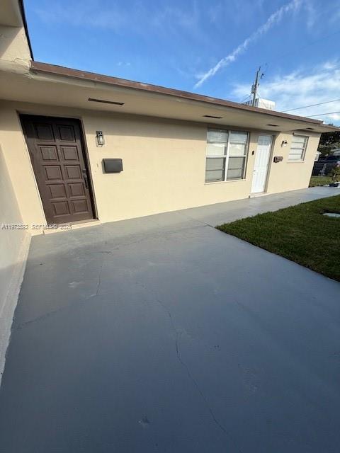 11063 Southwest 5th Street, Unit 11063 Sweetwater, FL 33174 - Photo 18 of 19 a house view with a outdoor space
